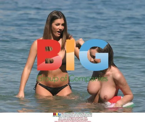 Glamour Models Lucy Pinder and Sophie Howard at the Beach
