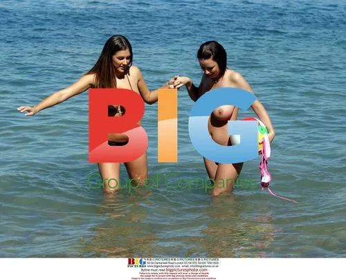 Glamour Models Lucy Pinder and Sophie Howard at Caribbean Beach
