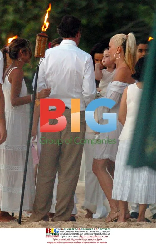 Model Caprice and Brian Lara at Beach Christening