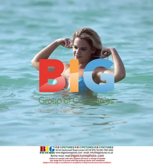 Emily Oldfield takes dip in Dubai