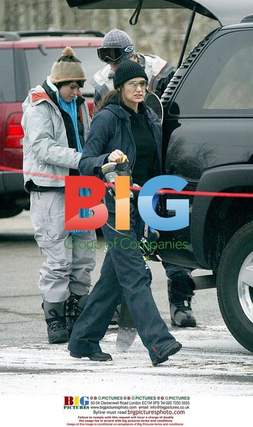 Demi Moore, Ashton Kutcher and Bruce Willis Skiing