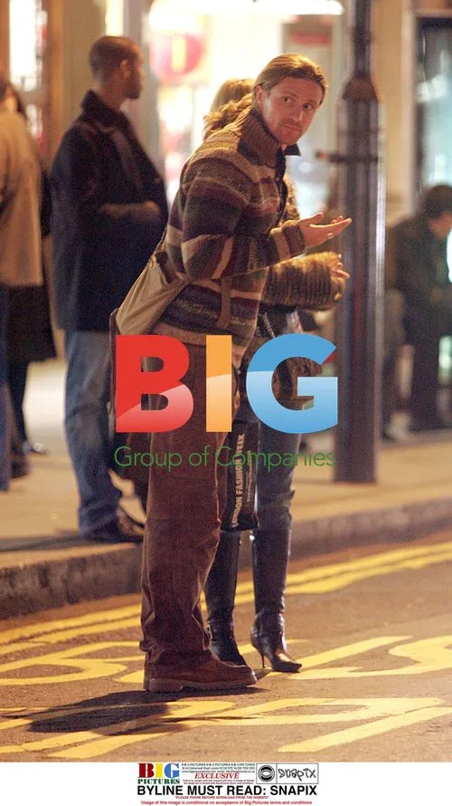 Emmanuel Petit and his girlfriend shopping in London