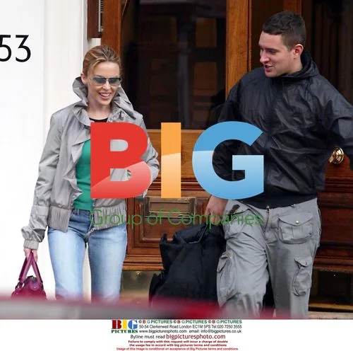 Kylie Minogue Steps Out of Home