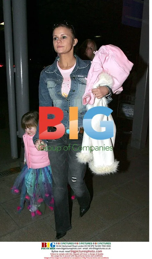 Kerry Katona and daughters arrive at airport
