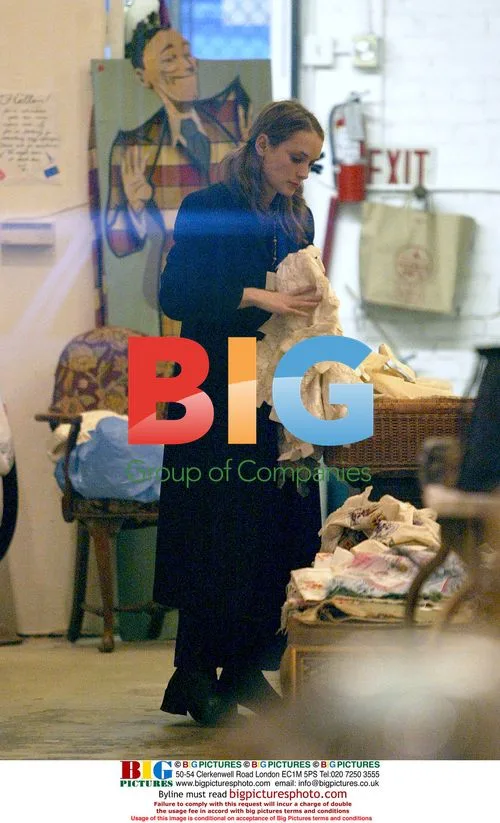 Winona Ryder Ducks Into Store During LA Storm