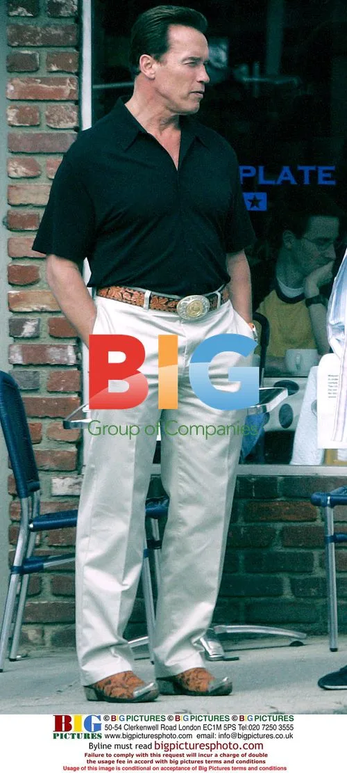 Arnold Schwarzenegger outside restaurant