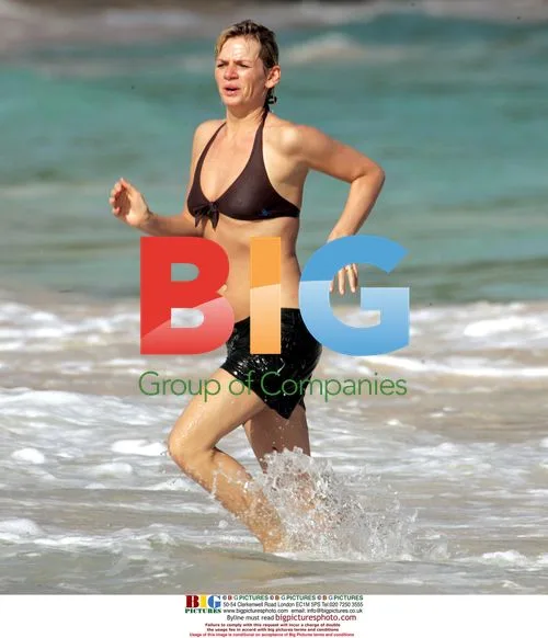Norman 'Fatboy Slim' Cook and Zoe Ball on Caribbean Beach