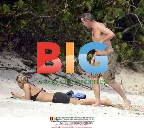 DJ Couple Zoe Ball and Norman 'Fatboy Slim' Cook on Beach