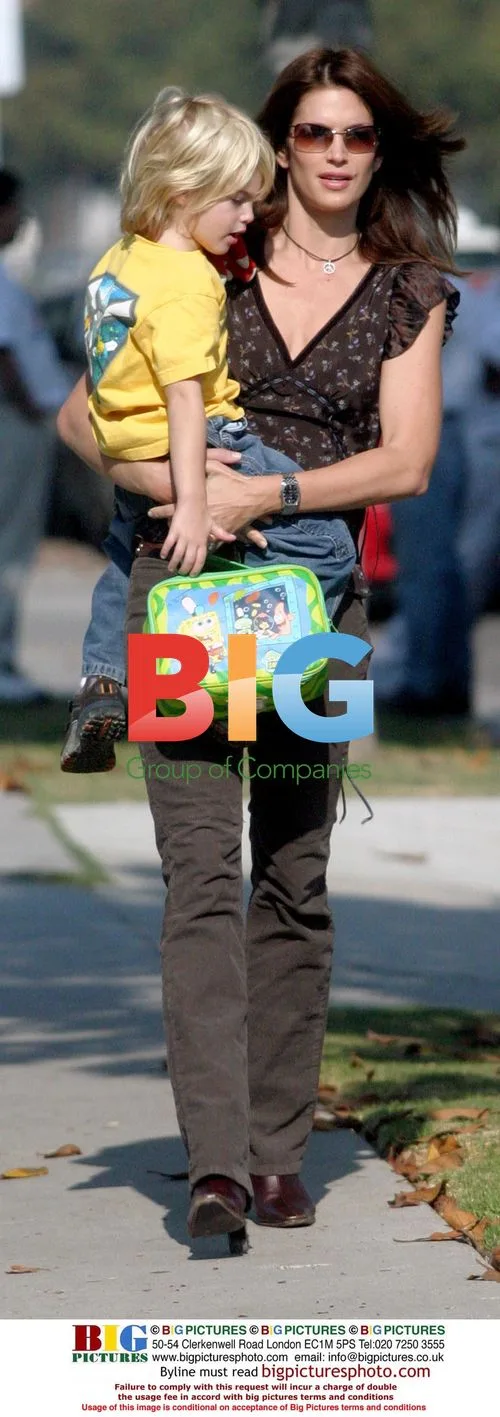 Cindy Crawford's Son Enjoys Being Carried to School