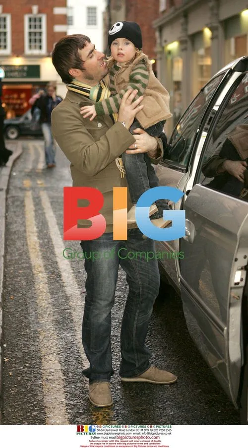 Liam Gallagher with son Gene in London's Soho