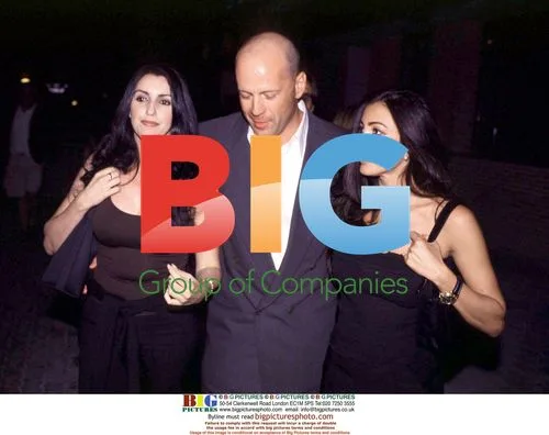 Bruce Willis Spotted with Spanish Sisters