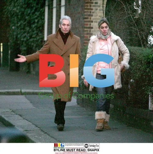 Charlie Watts and daughter on walk in London