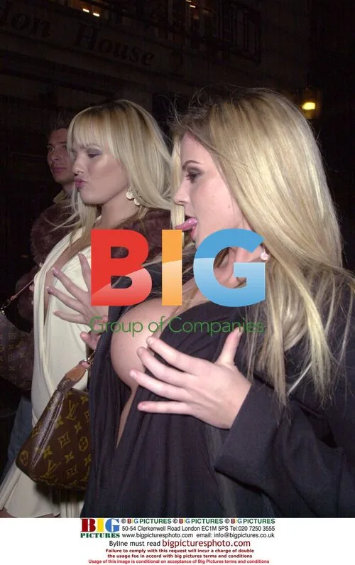 Glamour model Emily Oldfield leaving UK event