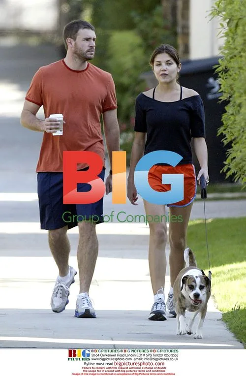 Scott Foley and Marika Dominiczyk with their dog