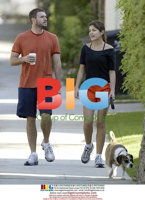 Scott Foley and Marika Dominiczyk walk dog