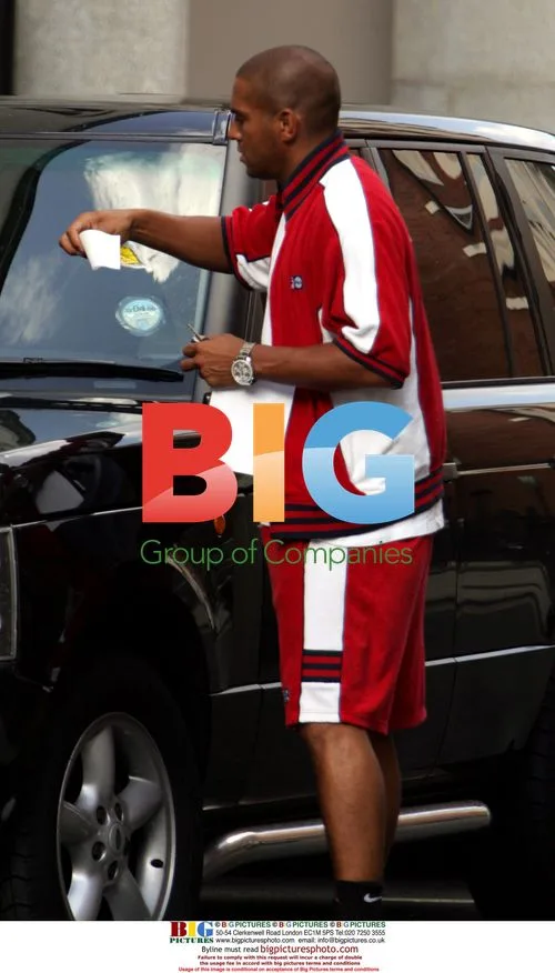 Stan Collymore Receives Parking Ticket