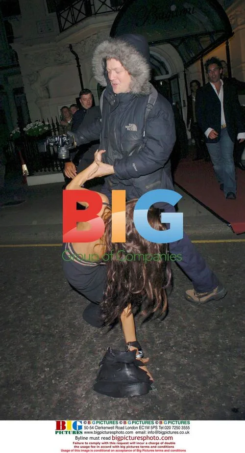 Coralie Slips at 'Diamonds' After Party