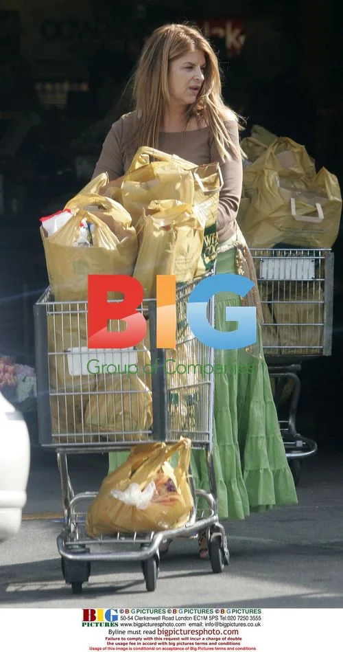 Kirstie Alley and son do market shopping