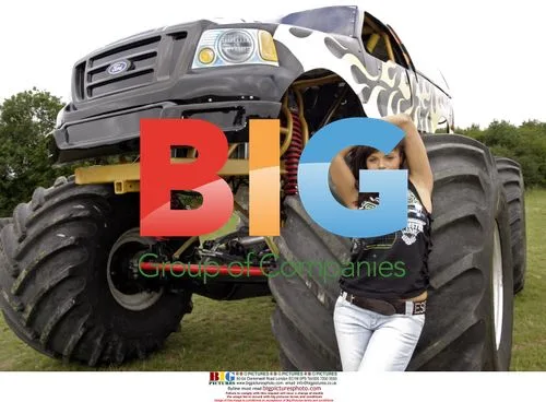 Model Jerri Bryne poses with 'Inferno' monster truck