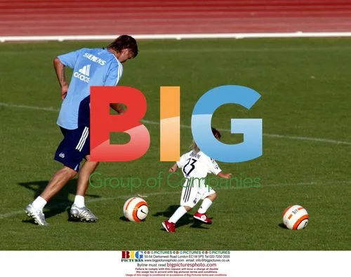 Beckham Shares Skills With Sons