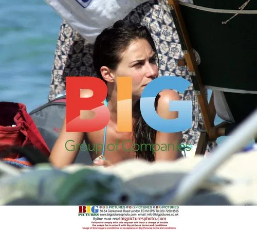 Claire Forlani on Beach in France