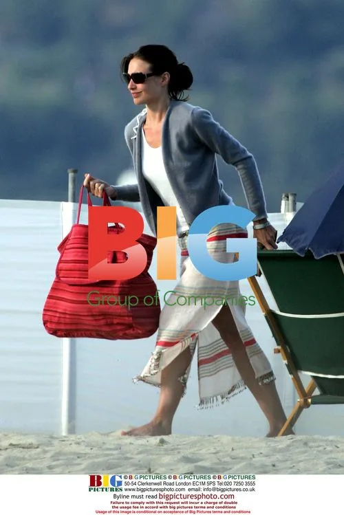 Claire Forlani on beach in France