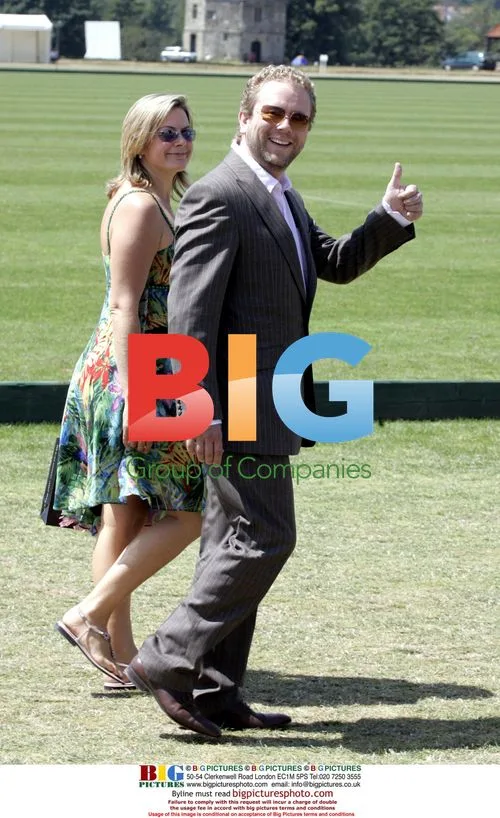 Jon Culshaw and girlfriend at Veuve Clicquot Gold Cup