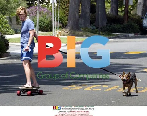 Owen Wilson Walking Dog on Motorized Skateboard