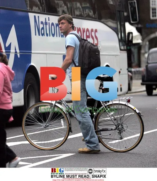 TV Presenter Richard Madeley Bikes Through London