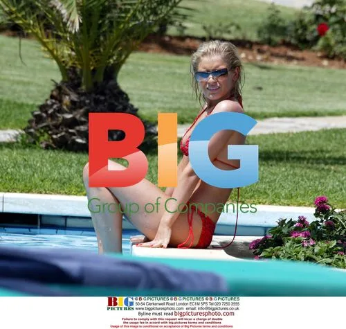Suzanne Shaw Sunbathing by Pool