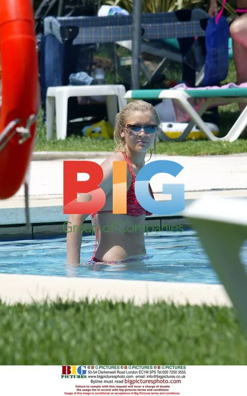 Singer Suzanne Shaw Relaxes by Pool