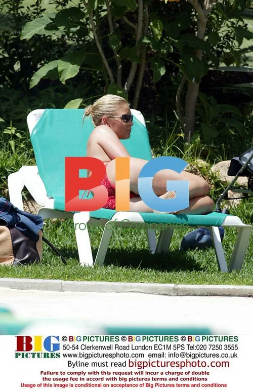 Suzanne Shaw Relaxes by Pool