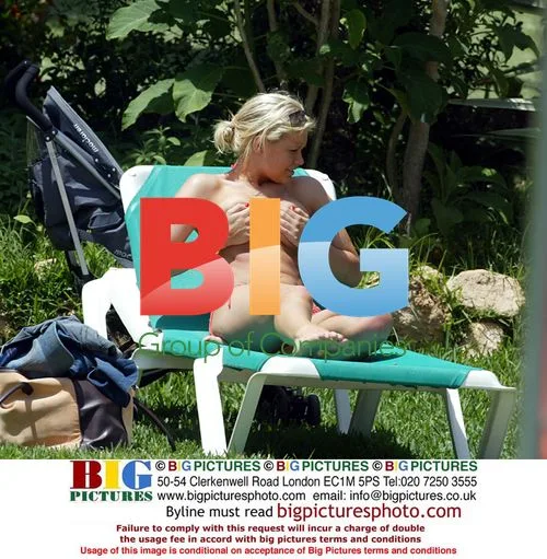 Suzanne Shaw Relaxes Poolside