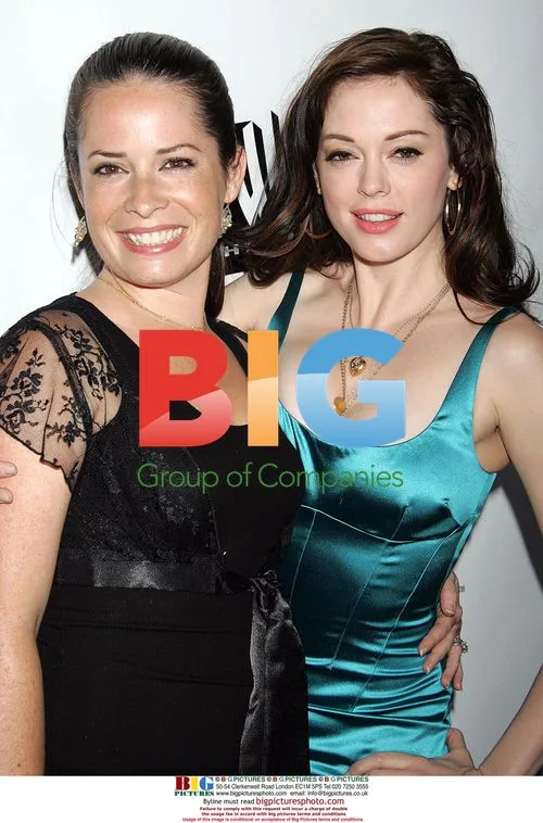 Holly Marie Combs and Rose McGowan at 2005 WB Party