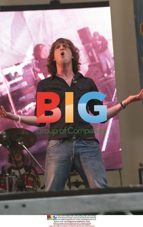 Singer Nick Atkinson of Rooster Performs