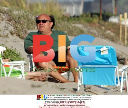 Danny DeVito Naps on Beach