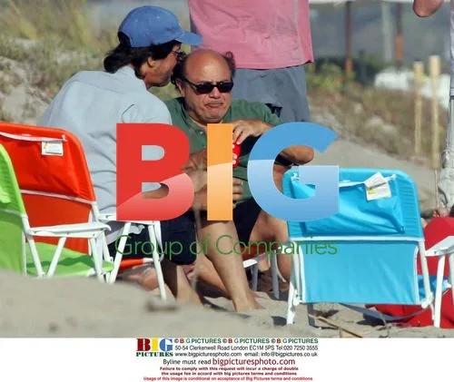 Danny DeVito Naps on the Beach