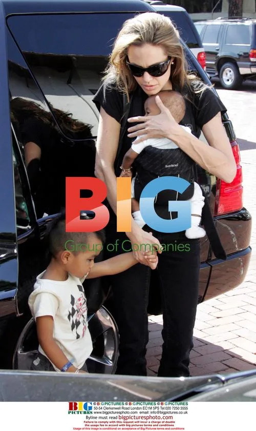 Angelina Jolie with kids at toy shop