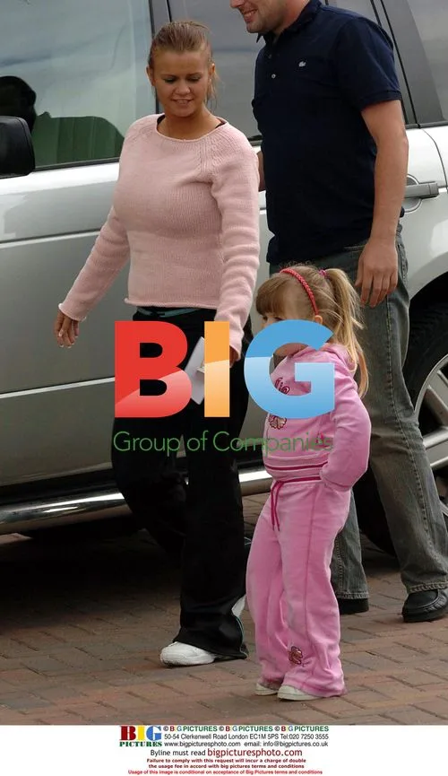 Kerry Katona returns home with boyfriend