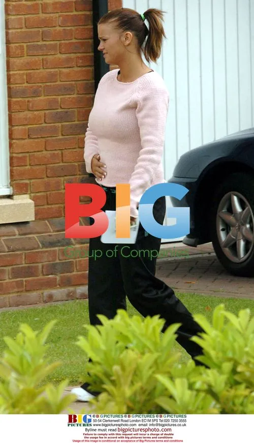 Kerry Katona sticking out tongue