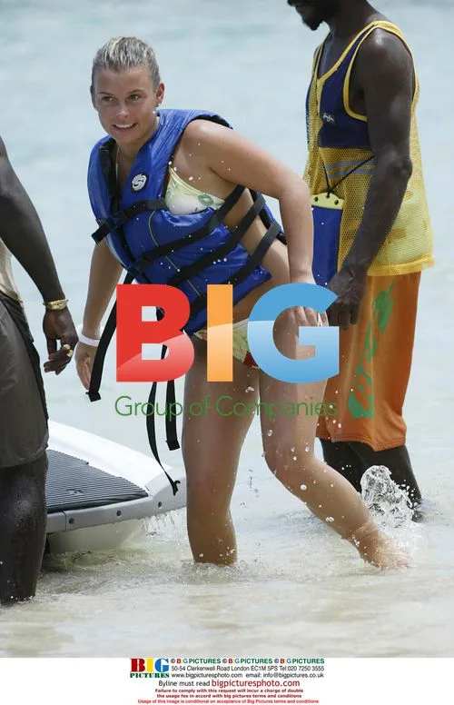 Wayne Rooney and Coleen on Caribbean beach