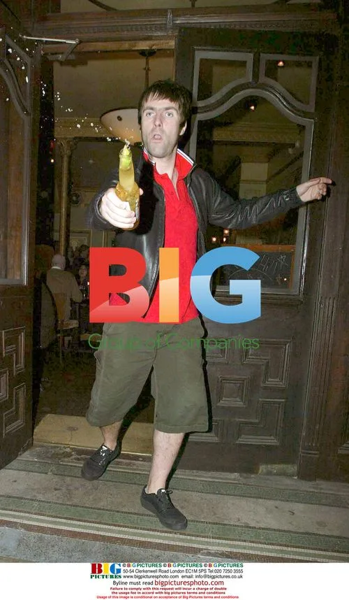 Liam Gallagher Throws Beer on Photographers