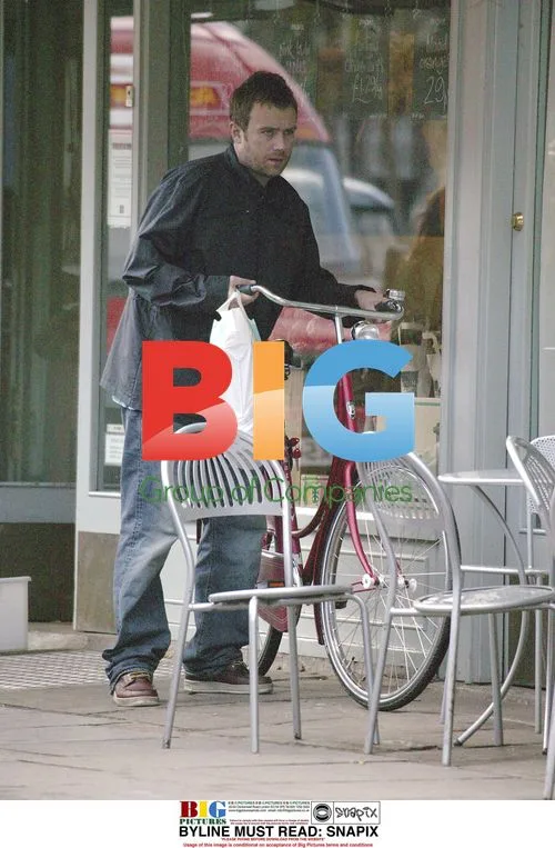 Damon Albarn out shopping on bike