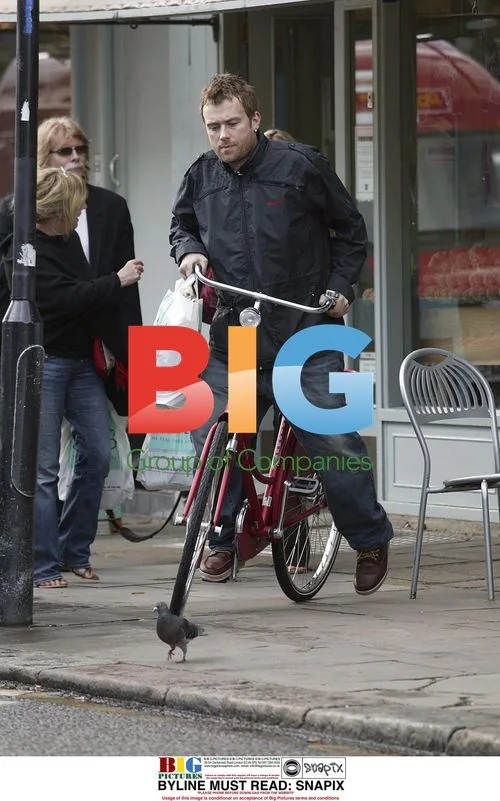 Damon Albarn Shops on Bike