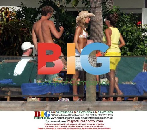 Rebecca Loos and Isabella Hervey sunbathing in Fiji
