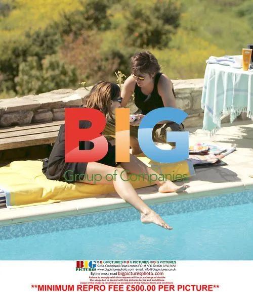 Rebecca Loos and Emma Basden Poolside in Cyprus