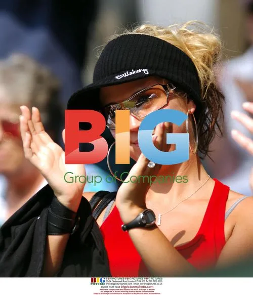 Bec Cartwright cheers on Lleyton Hewitt at Wimbledon