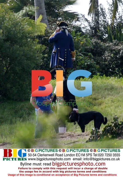 Orlando Bloom with dog on Pirates 2 set