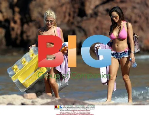 Glamour Models Jo Hicks and Jerri Byrne Playing in the Sea