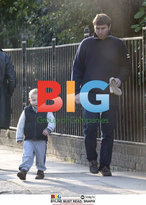 Mike Atherton and son at playground